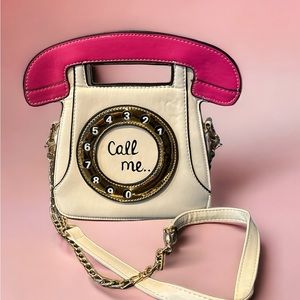 Conversation piece. Call me telephone Crossbody.
